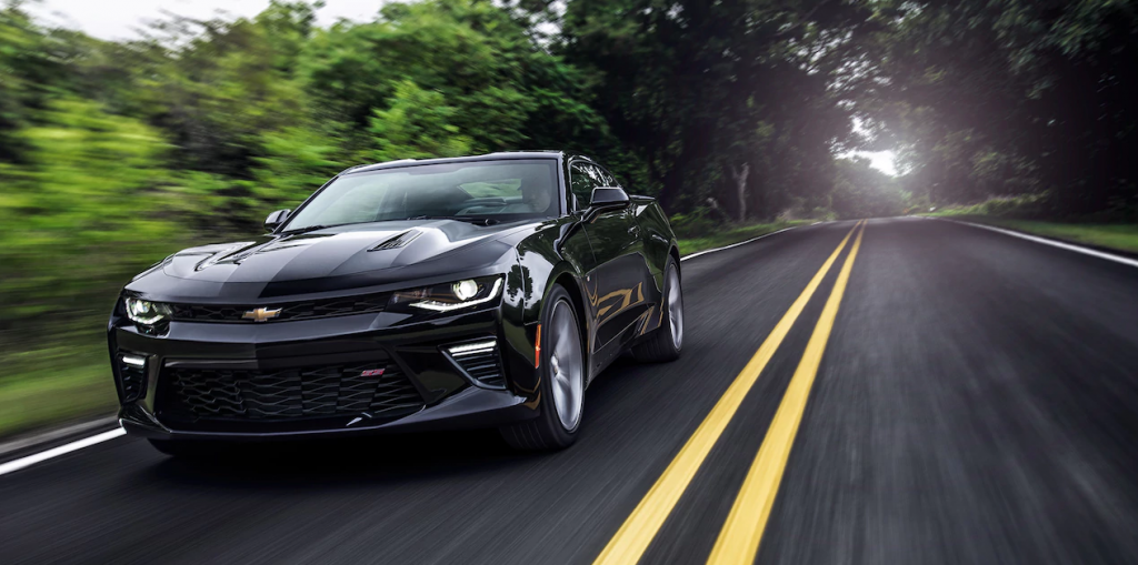 2017 Chevy Camaro driving down a road