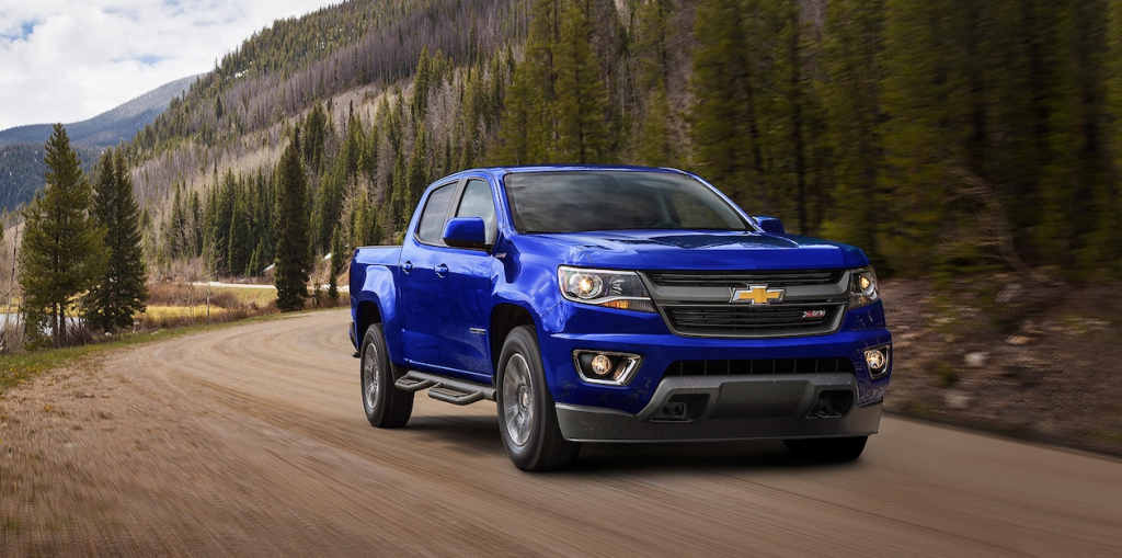 2017 Chevy Colorado driving down a road