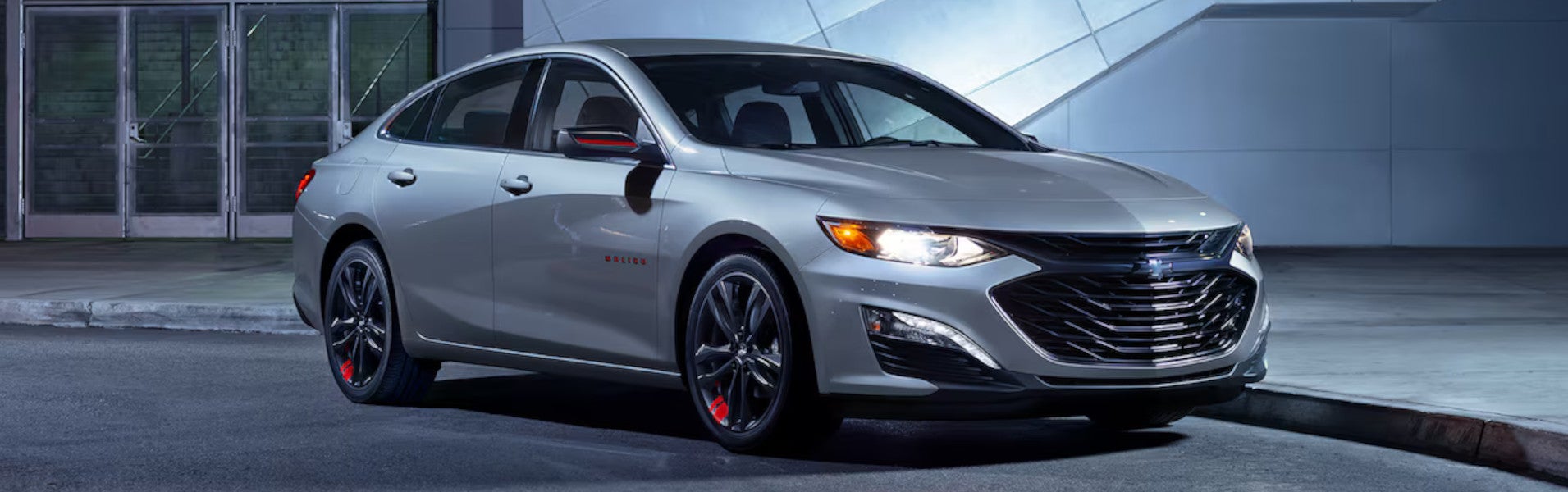 2025 Chevy Malibu parked on an urban road